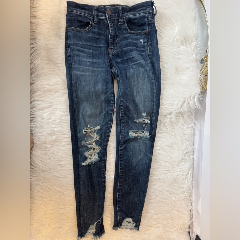 American Eagle next level stretch size 2, distressed at knee and ankle